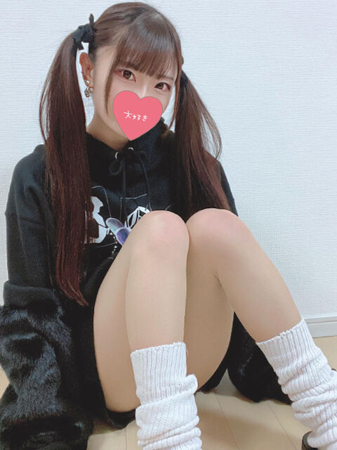 壁に手をついて